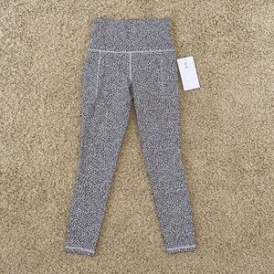 Athleta | Salutation Stash Pocket II Tight (NWT)